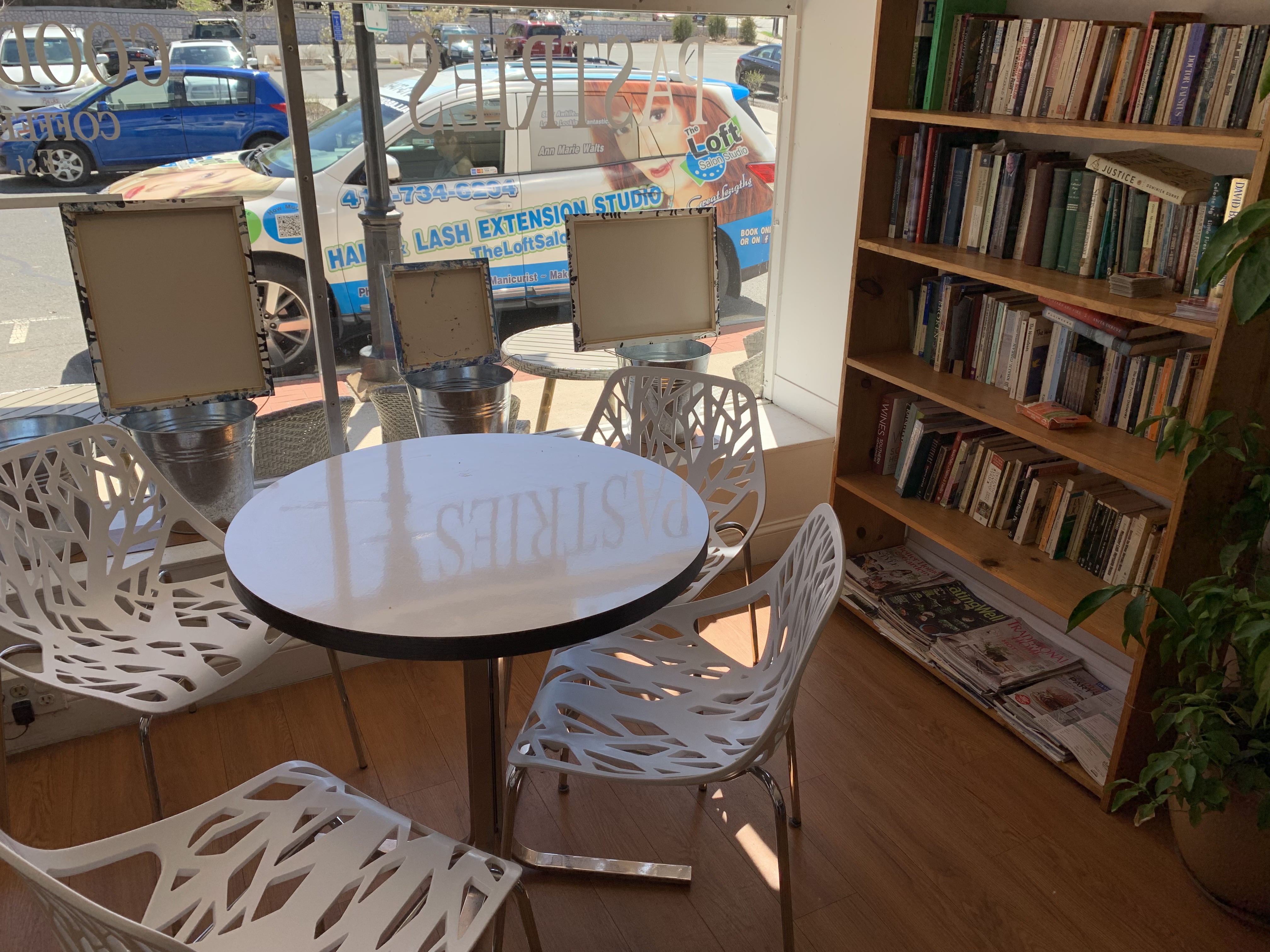 Seats with table and book case