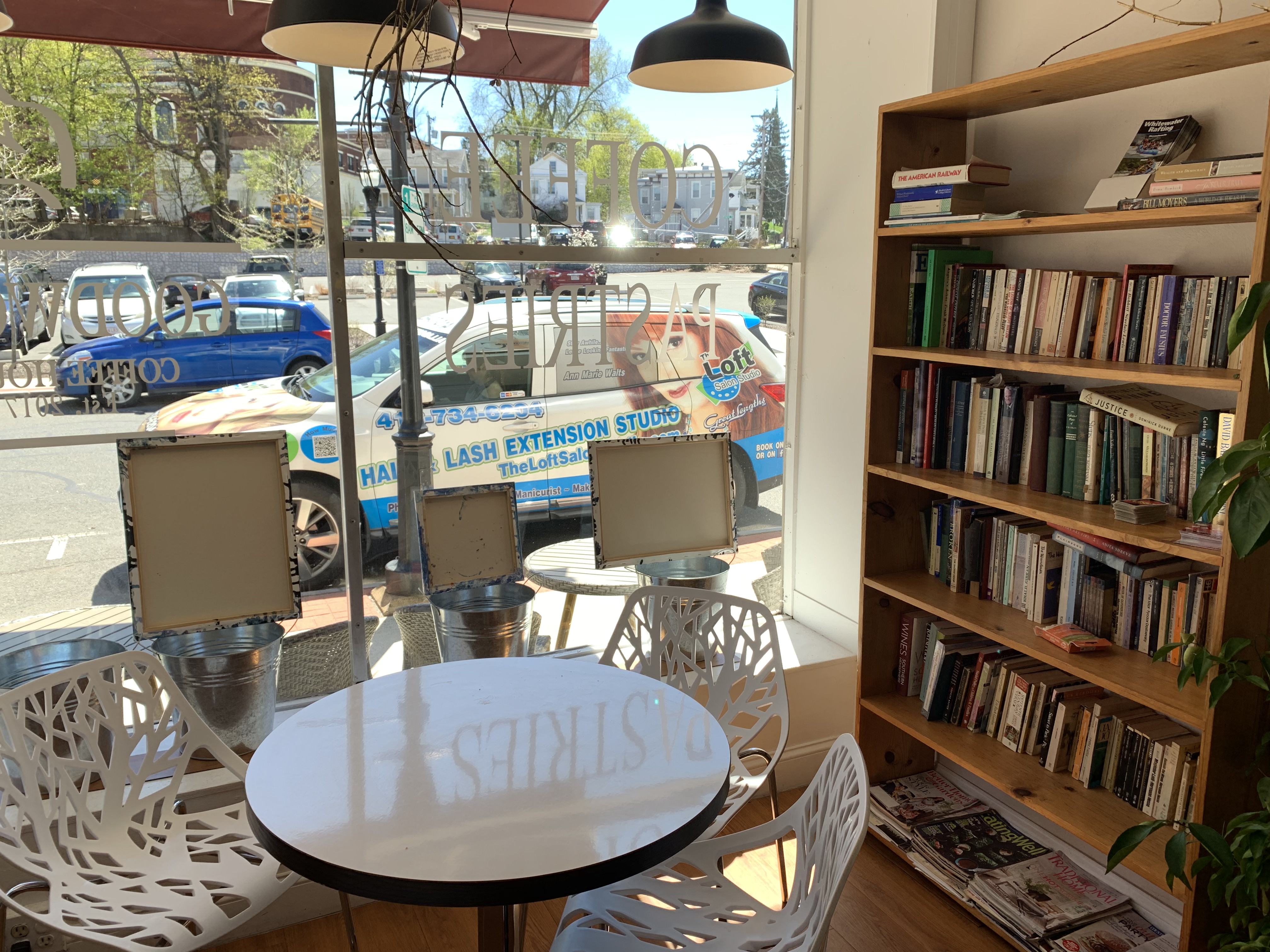 Seats with table and book case